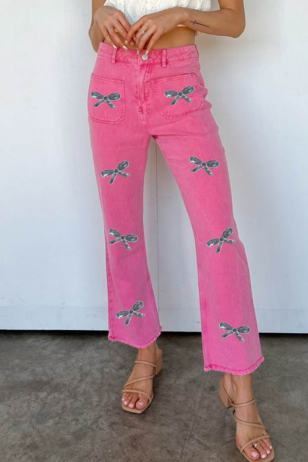 Shewin Wholesale Trendy Pink Sequin Bow Knot Graphic Raw Hem High Waist Flared JEANS