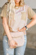 Samarreta casual per a dona amb una butxaca al pit de ratlles de bloc de colors