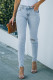 Jeans ajustats casuals per a dona amb dobladillo cru trencat blau clar