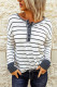 Samarreta de màniga llarga amb botons de ratlles en blanc i negre per a dona