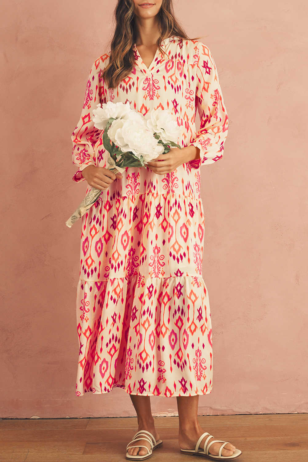 Vestit maxi amb escot en V estampat geomètric abstracte taronja