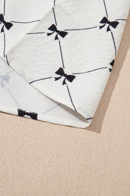 White Checkered Bow Print Knot Front Puff Sleeve Blouse