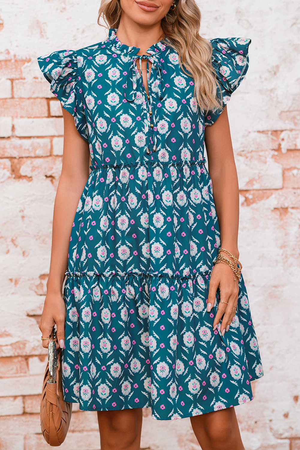 Vestit blau de màniga curta amb coll dividit amb estampat floral retro