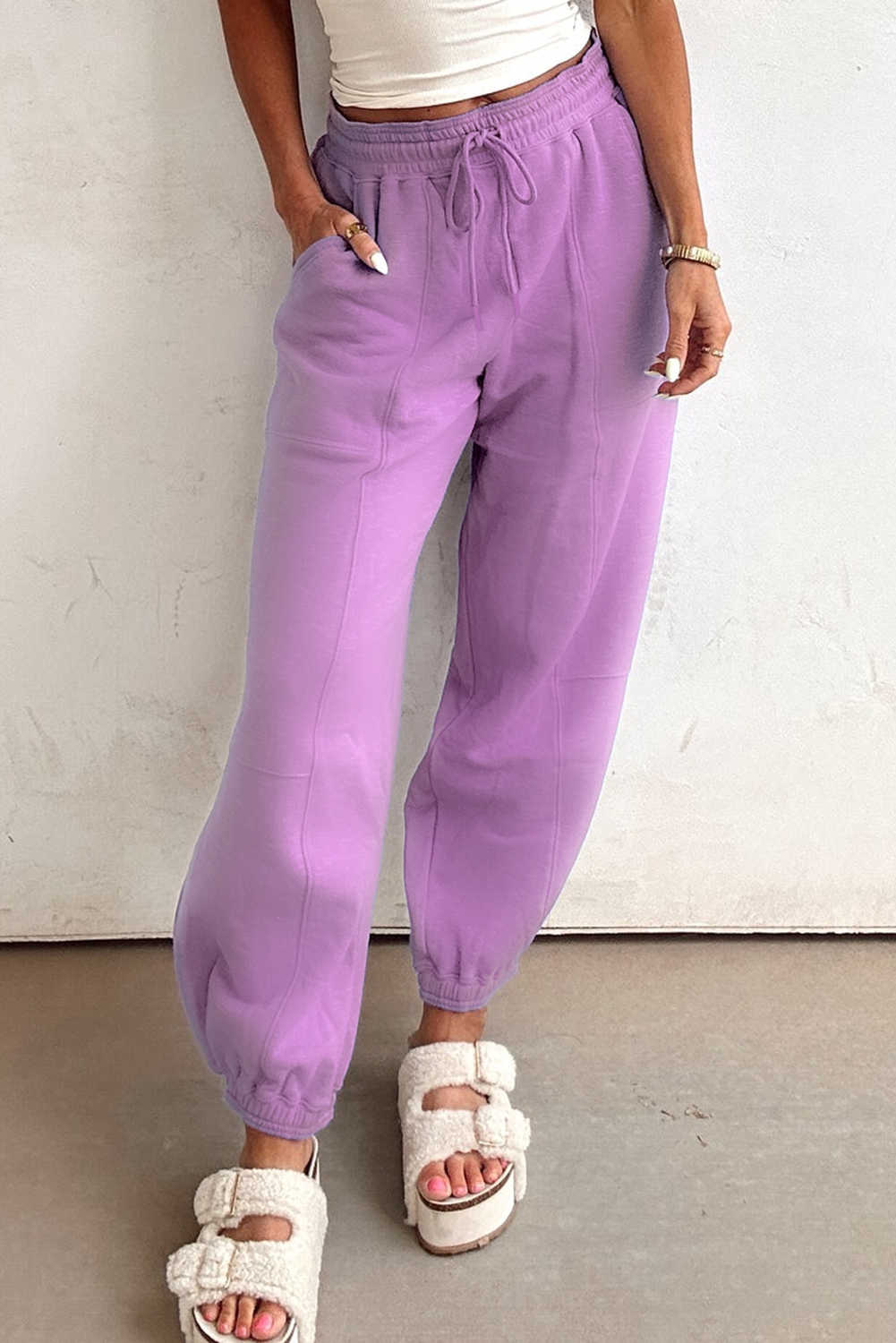 Pantalons joggers de retalls de color lila amb cintura elàstica