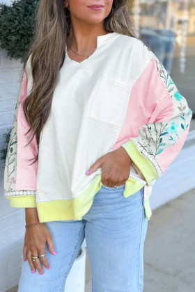 Top de màniga llarga amb coll oscat i blocs de color floral blanc