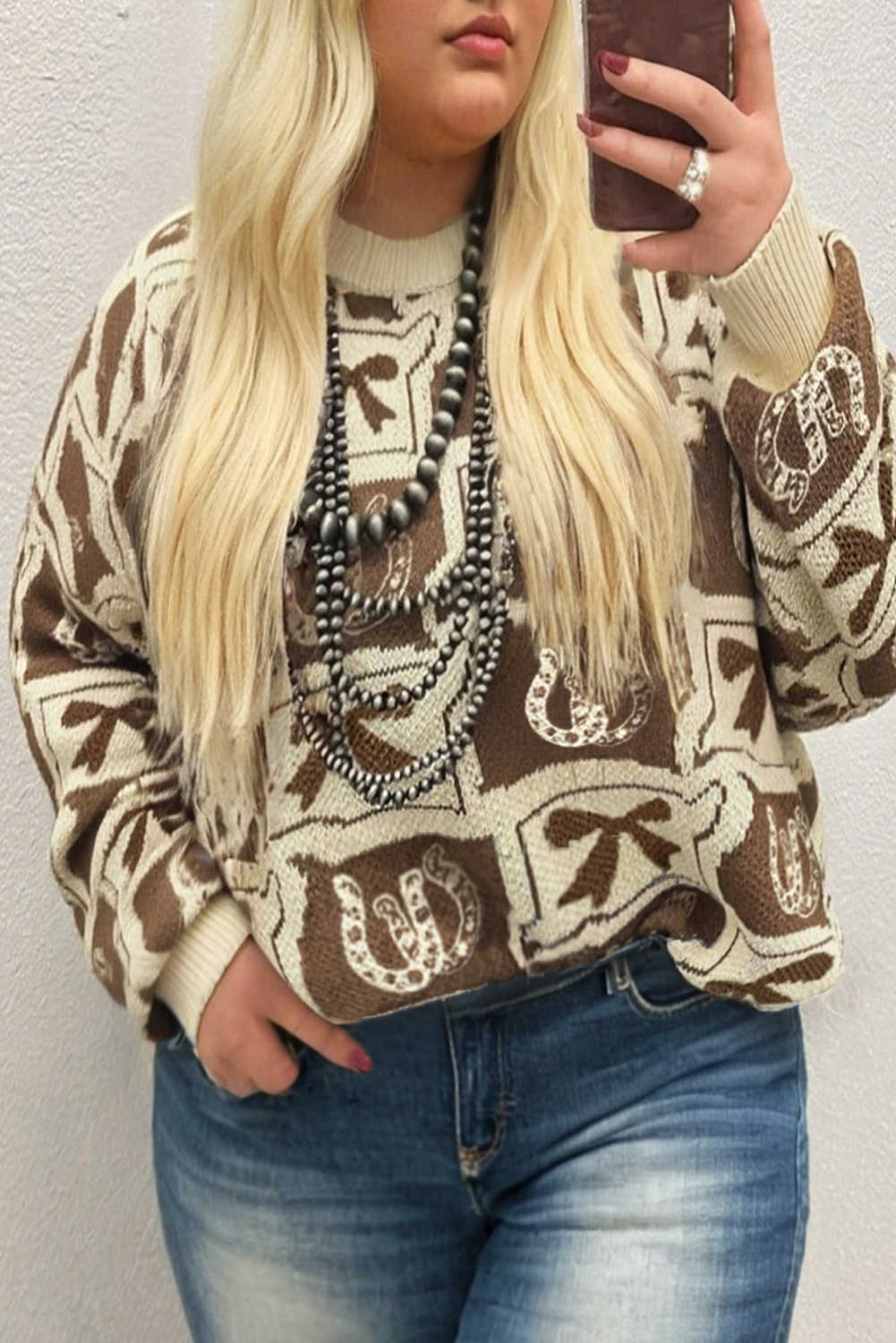 Jersei marró a quadres amb estampat de ferradura i llaç de talla gran