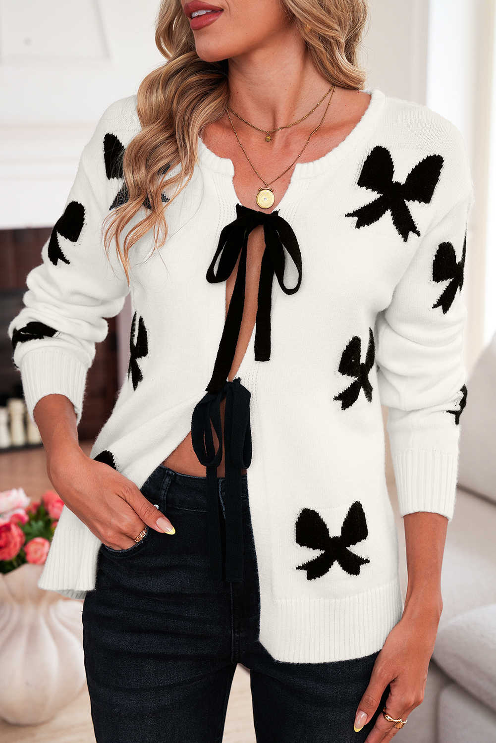 Càrdigan de punt de coll rodó amb llaç al davant i cordons blancs