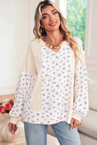 Top beix amb estampat floral de gofre i pegats amb màniga globus i coll en V extragran