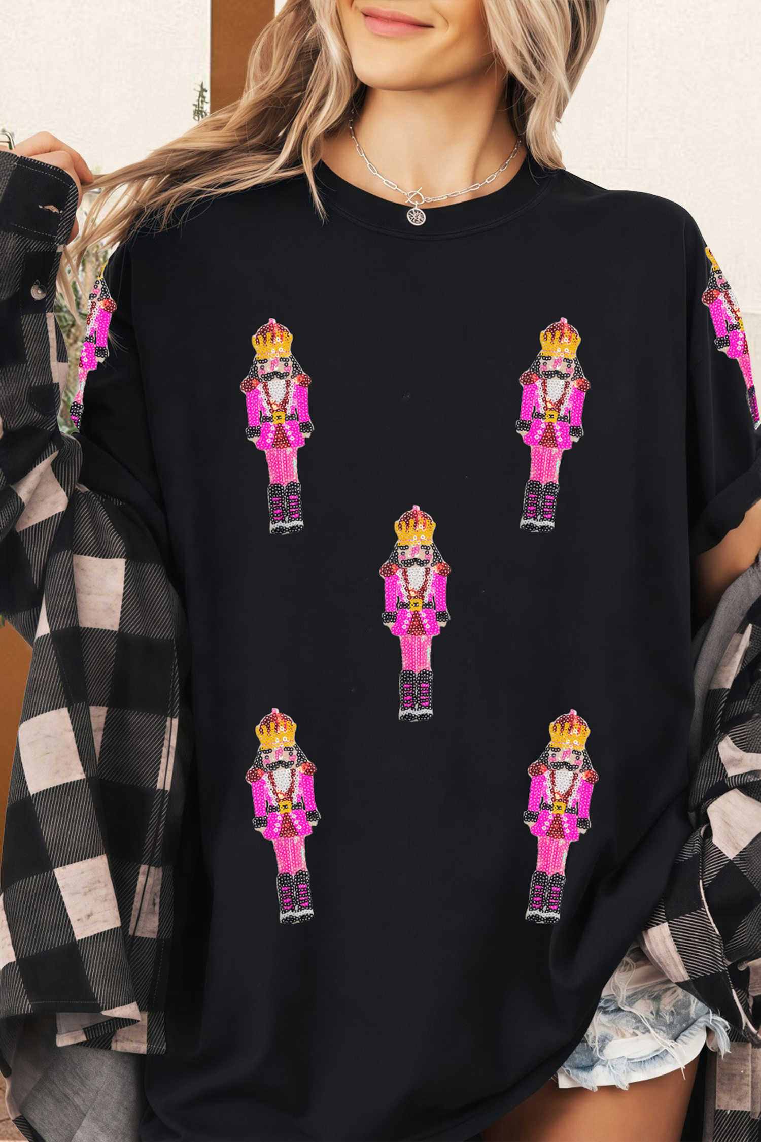 Samarreta informal de trencanous de Nadal amb pegats de lluentons negres