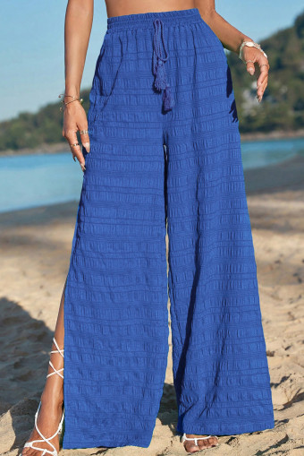 Pantalons blau fosc amb textura i cama ampla i sòlida