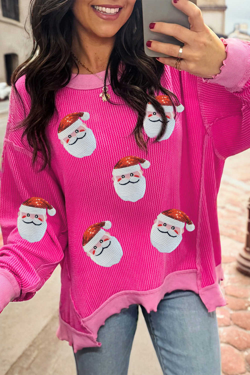 Top estampat de Pare Noel amb patchwork de lluentons i blocs de color acanalats trenats de color rosa maduixa