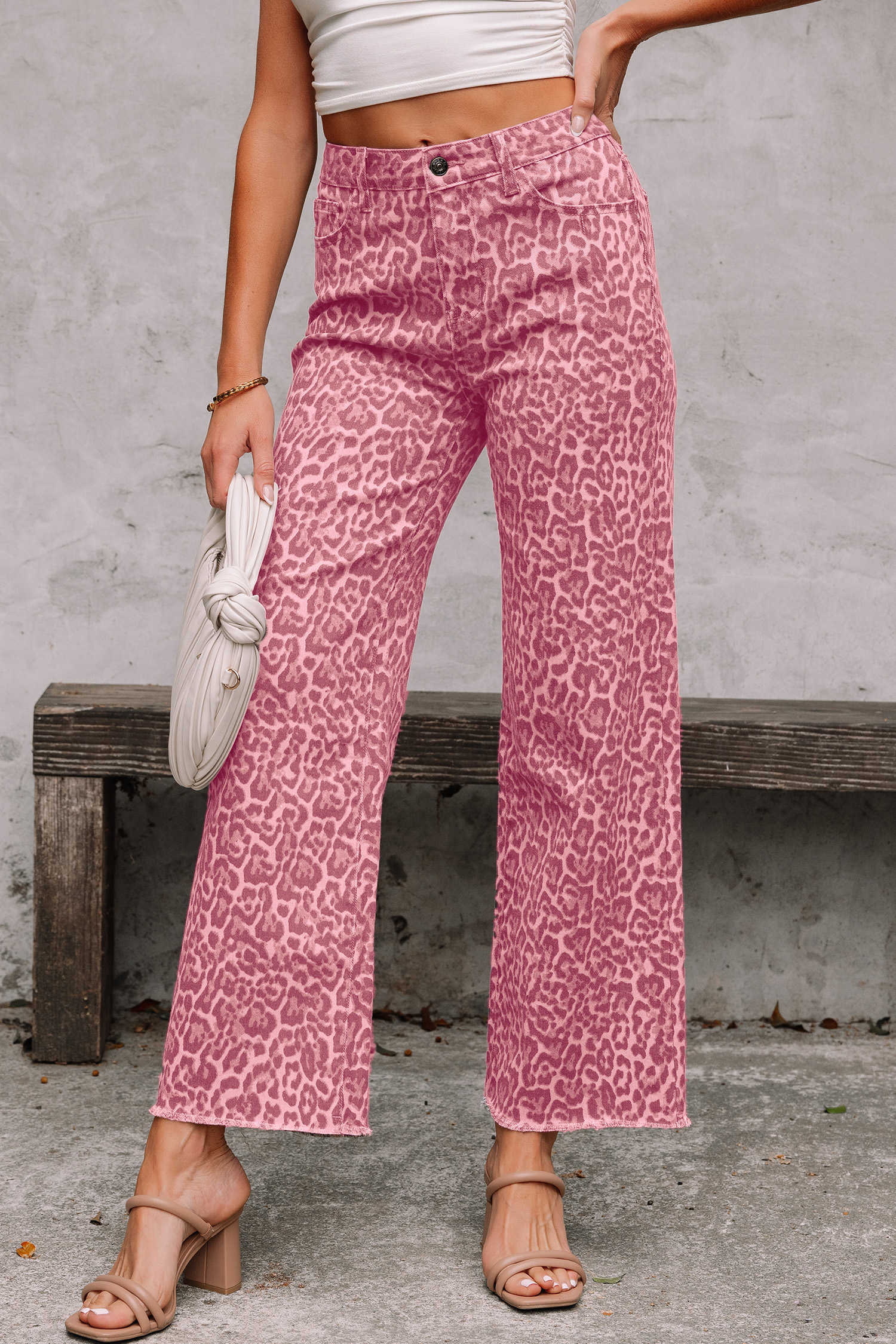 Jeans de cintura alta amb vora desfilada de lleopard rosa