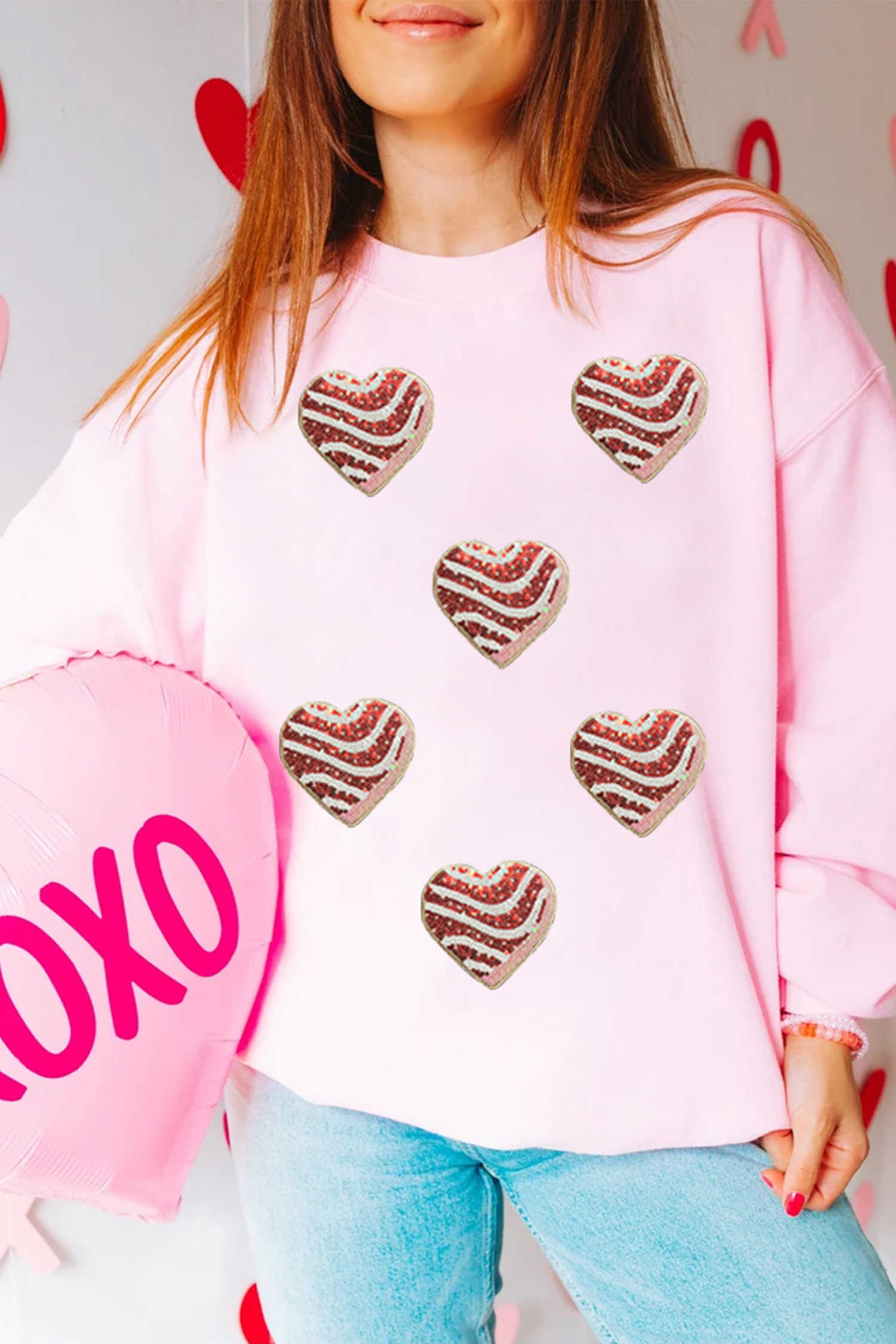 Dessuadora de coll rodó amb estampat de cors de Sant Valentí amb lluentons rosa