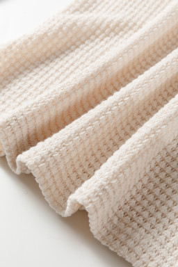 Jet Stream Solid Color Textured Knit Asymmetric Shoulder Long Sleeve Top