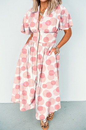 Vestit llarg rosa amb volants i màniga curta i cremallera