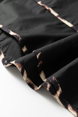 Black Plus Size Long Sleeve Leopard Contrasted Trim Tie Neck Flared Mini Dress