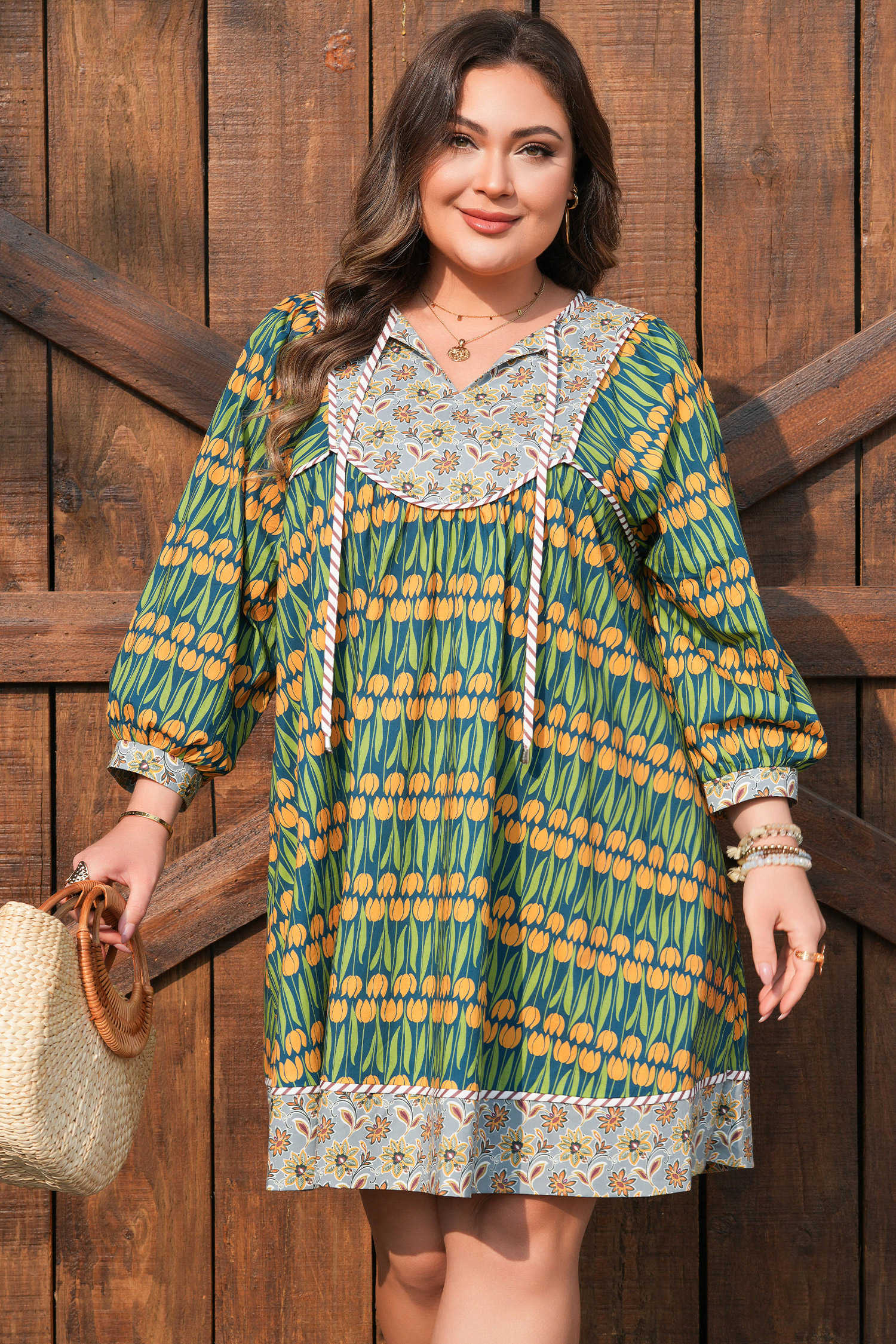 Vestit mini ample verd amb estampat floral mixt de ratlles i talles grans