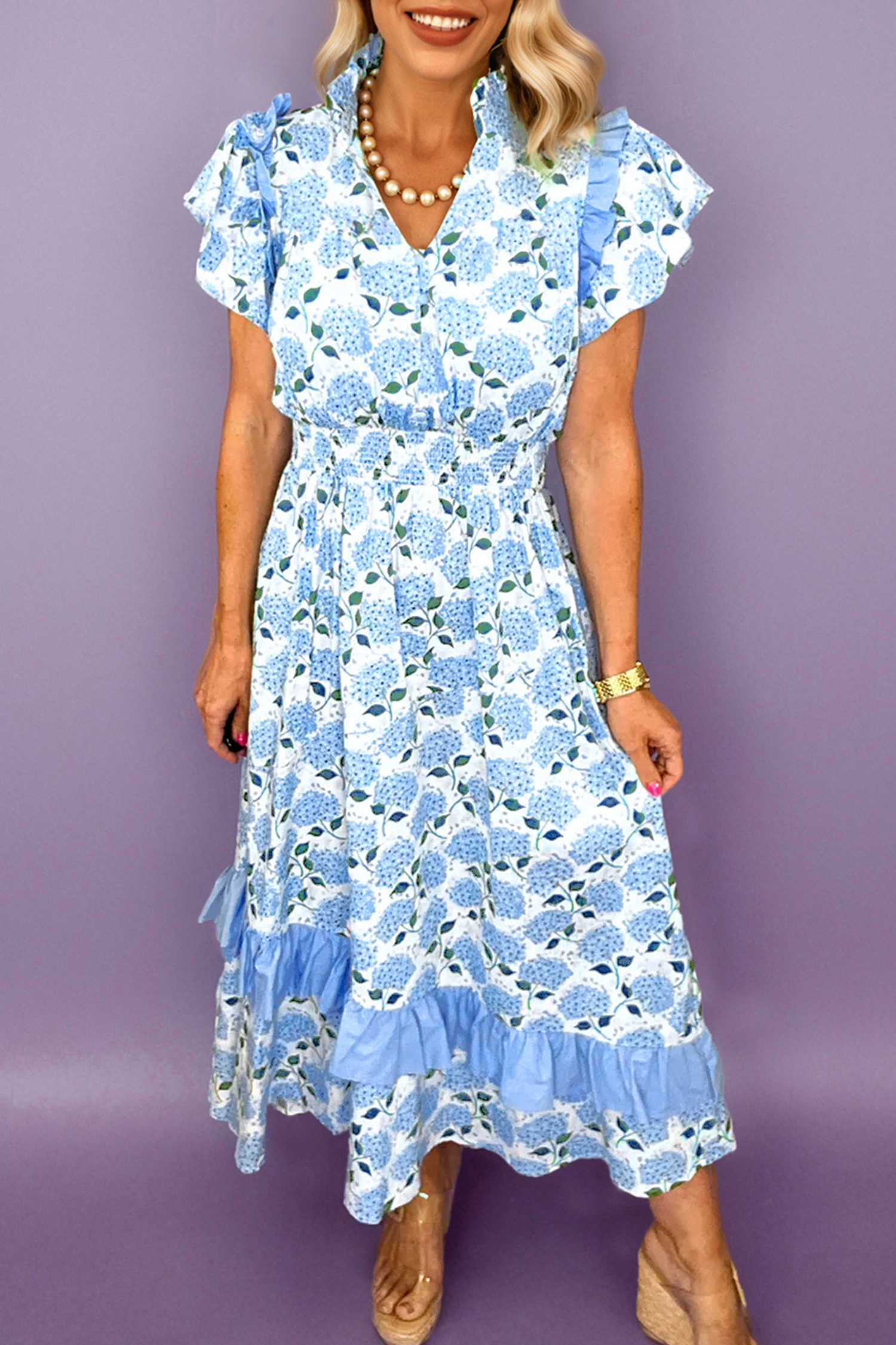 Vestit llarg de màniga ondulada amb estampat floral d'hortènsies blau cel