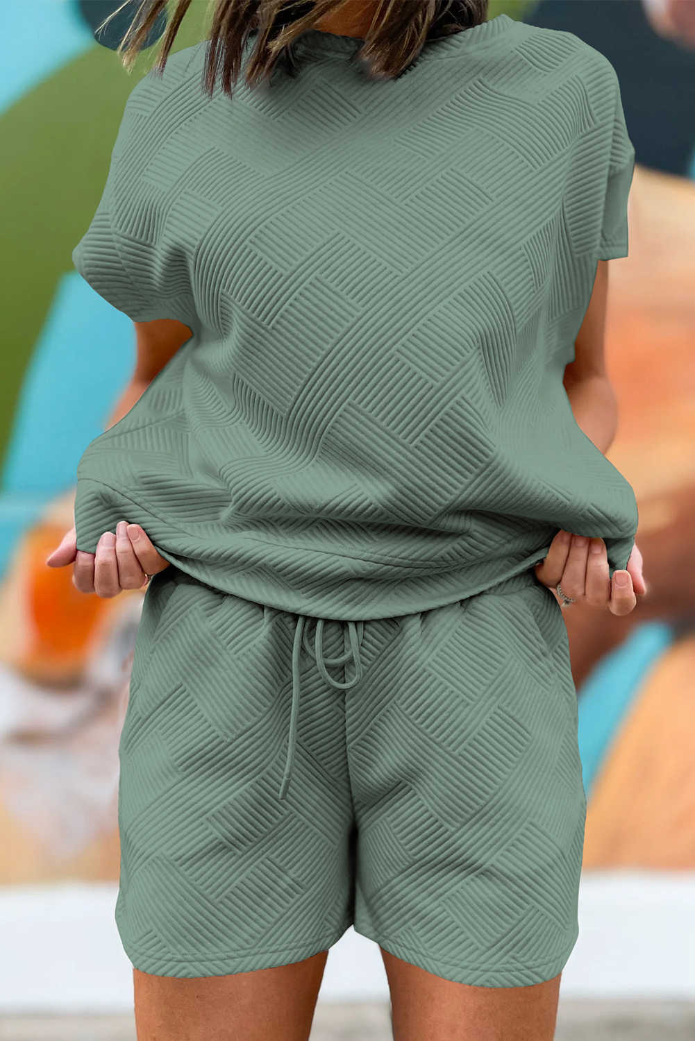 Conjunt de samarreta de màniga curta texturitzada blau mineral i pantalons curts