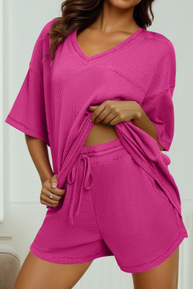 Conjunt de pantalons curts amb cordó i samarreta ampla amb coll en V i gofres de color sòlid rosa vermell