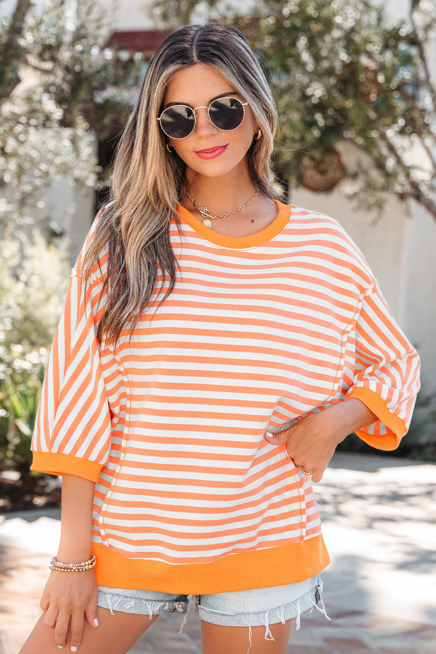 Orange Stripe 3/4 Sleeve Exposed Seam Patchwork Pullover Top