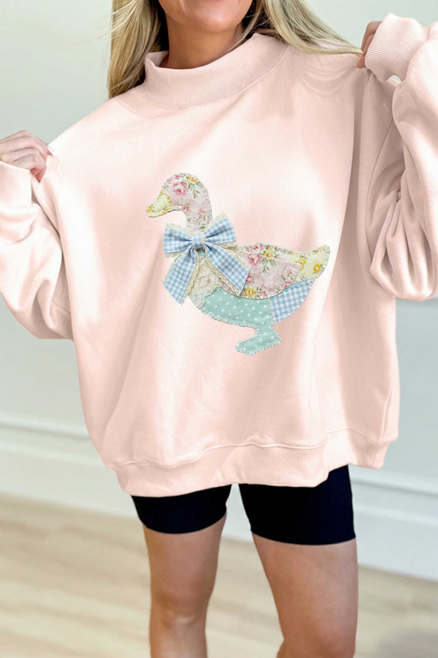 Apricot Pink Bow Knot Duck Faux Patchwork Printed Mock Neck Sweatshirt